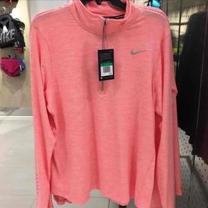 Women’s Nike half zip coral